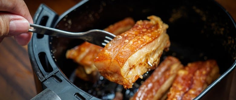 Photo of fried pork tenderloin cooked in quick in air fryer